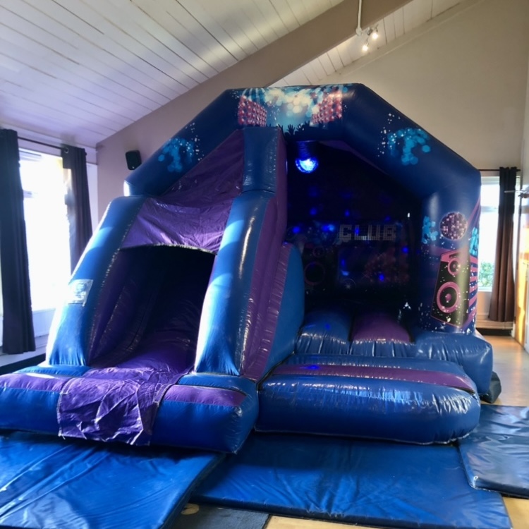 Disco bouncy castle indoor hire for children’s parties in Sidcup disco bouncy castle with slide for hire in Dartford and Bexley