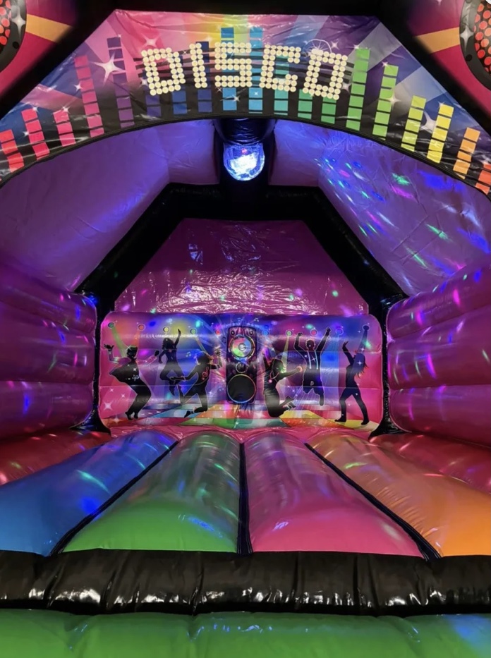 Disco bouncy castle with speaker and disco light for parties dartford Kids disco bouncy castles and for home parties in Dartford and Bexley