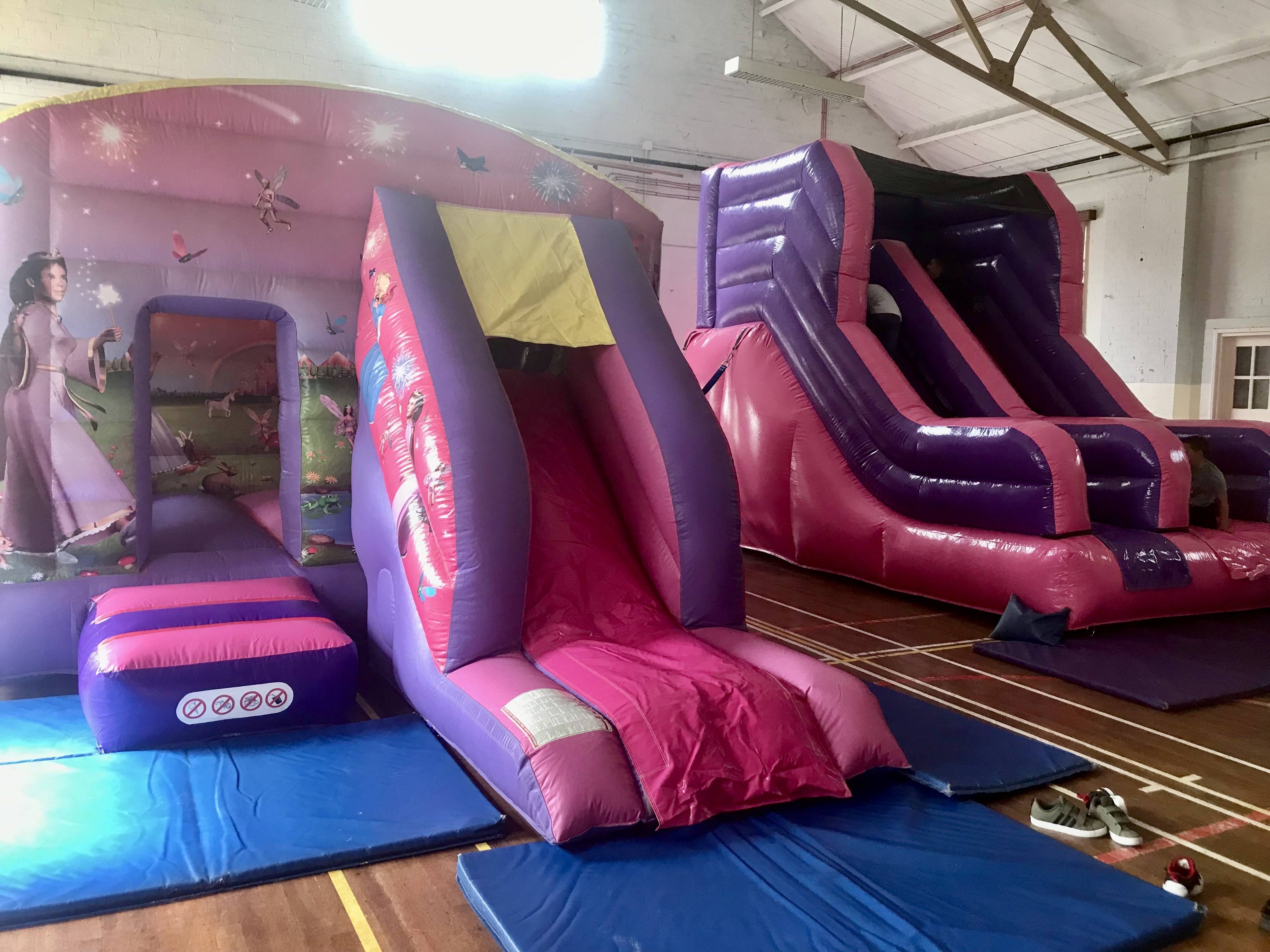 Pink and purple inflatable slide to hire for children’s parties in Sidcup 
