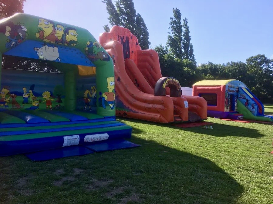 Volcano inflatable slide hire for schools in Bexley